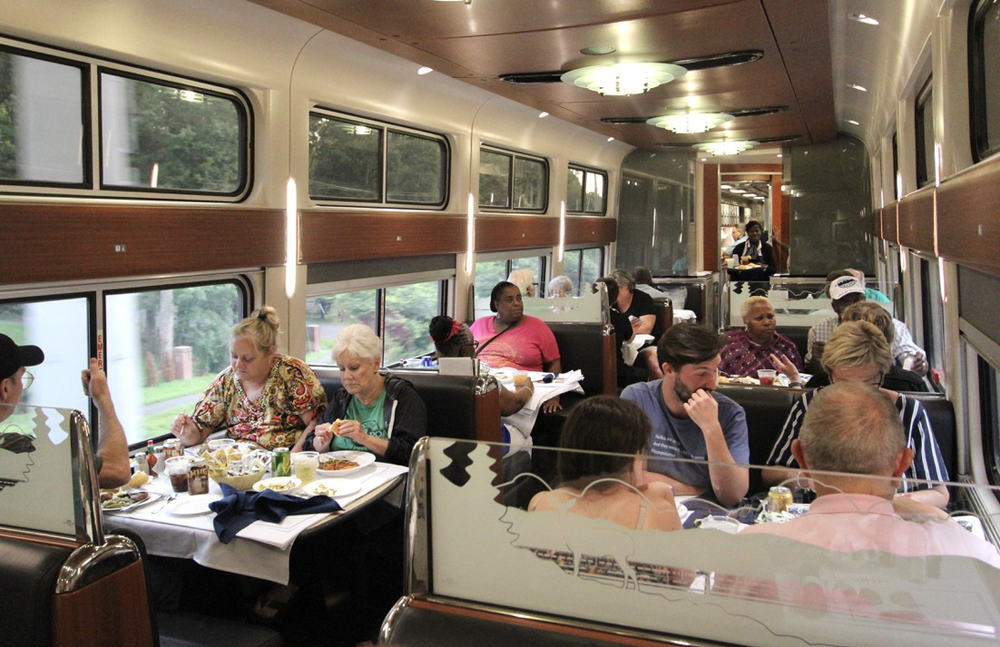 Interior of dining car with all tables filled