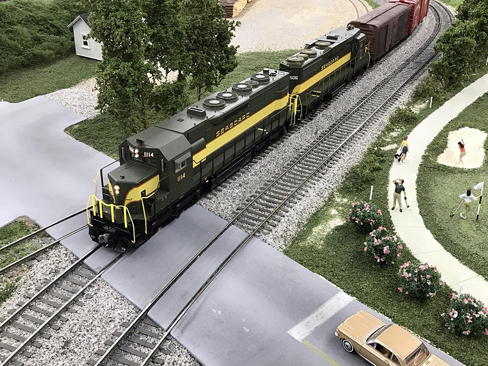 An image of a model locomotive on a model railroad layout