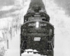 Front of Penn Central locomotives approaching camera in snow