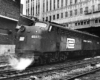 Streamlined diesel Penn Central locomotives under building