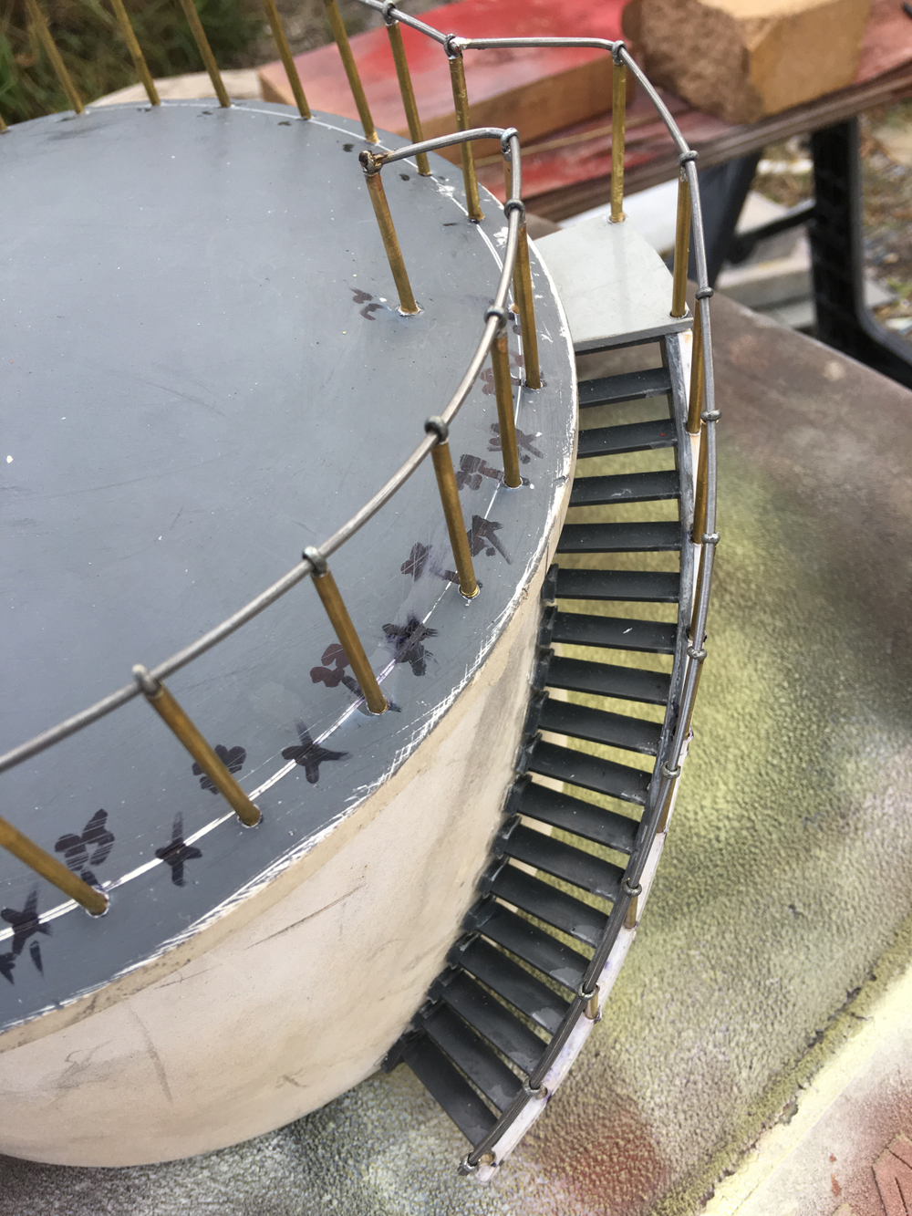 close up of cotterpin and brass tubing railing on model station