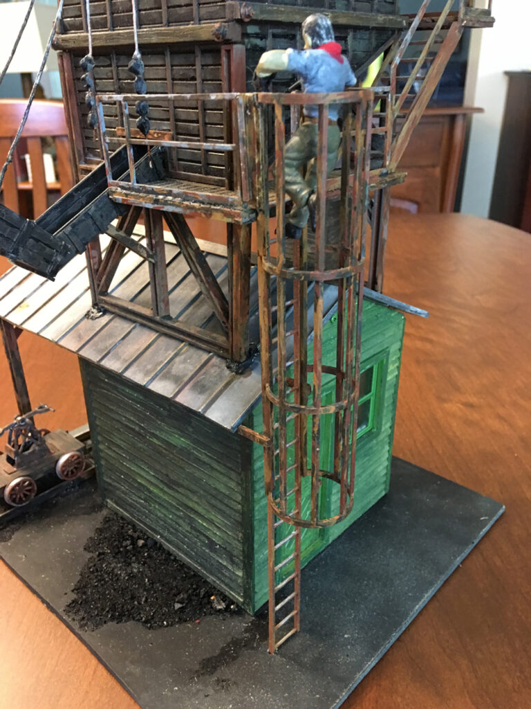 model coal tower with figure