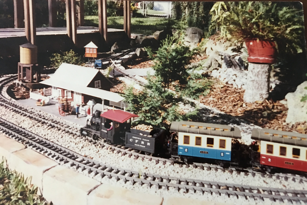 vintage photo of garden railroad with train