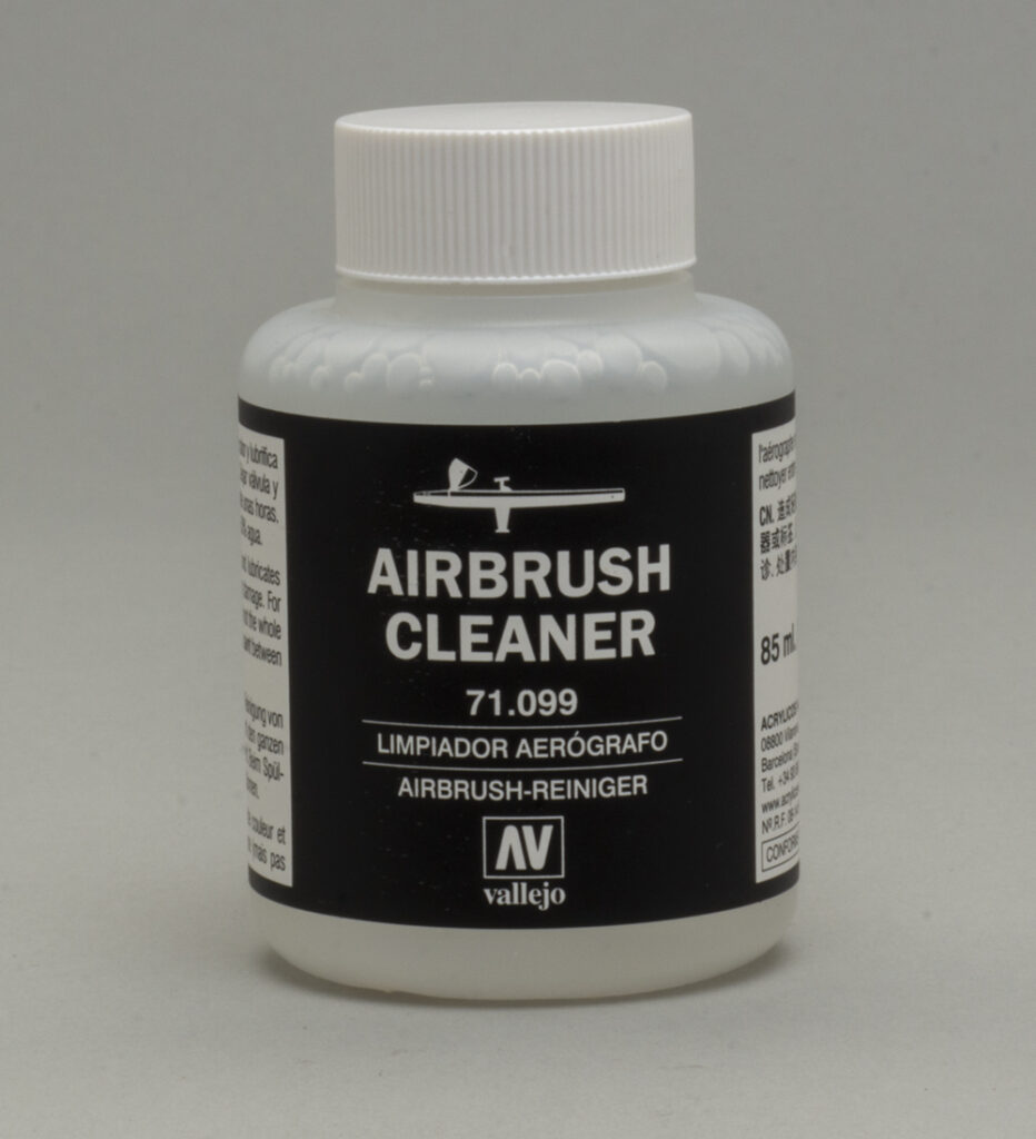 Color photo of airbrush cleaner bottle.