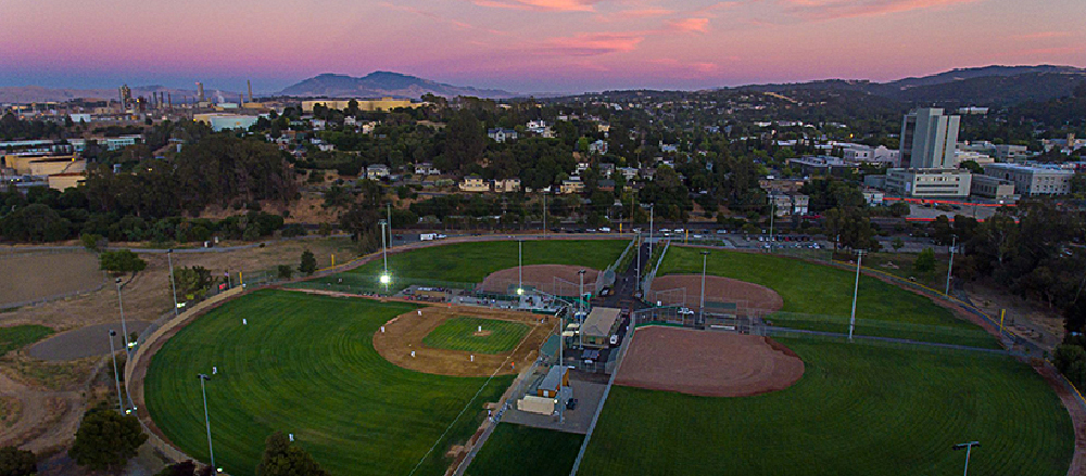 An array of four ball fields back-to-back. This is high iron baseball — exploring independent leagues.
