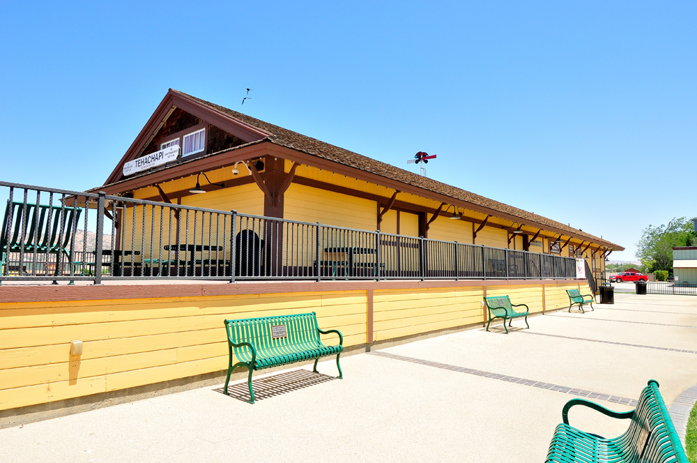 train station in sun with benches