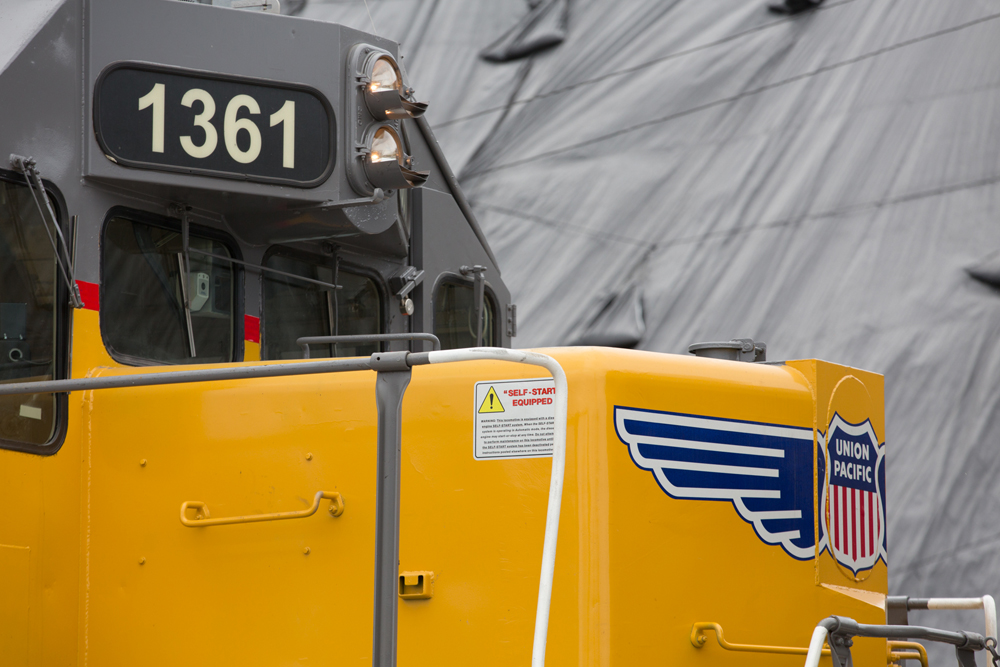 closeup of yellow locomotive's lights