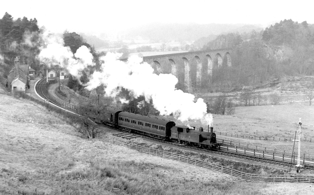 British steam locomotive with two-car train