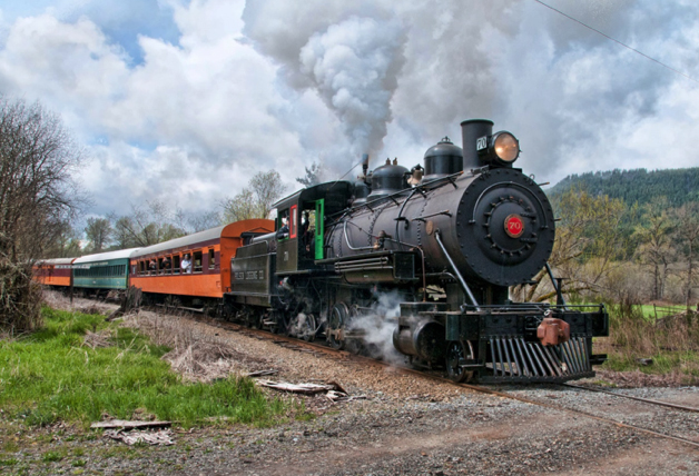 Steam locomotive with passenger cars