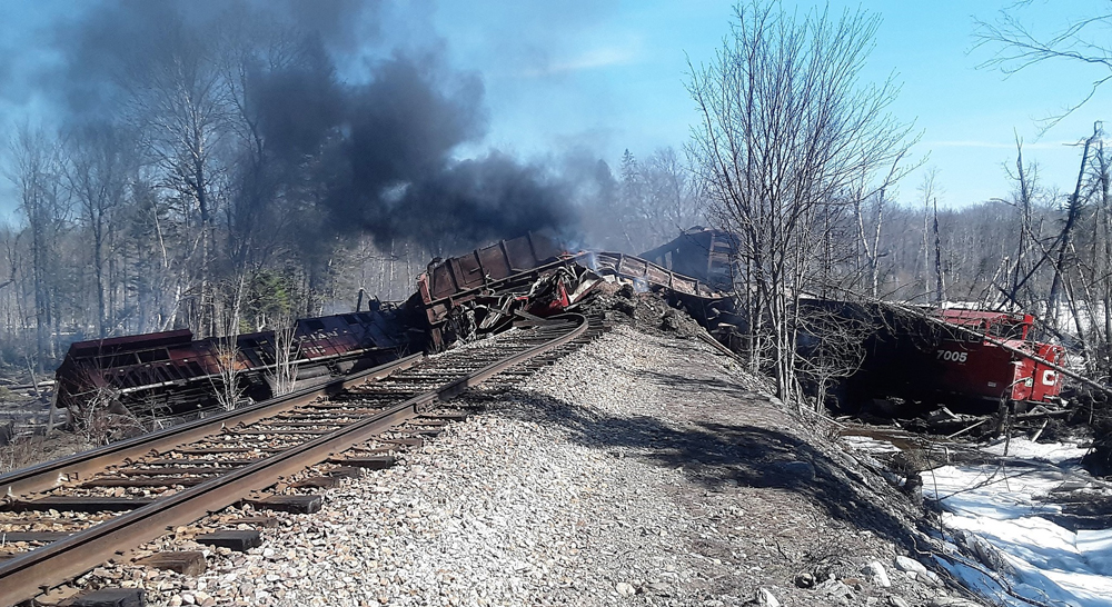 Derailed locomotives and freight cars