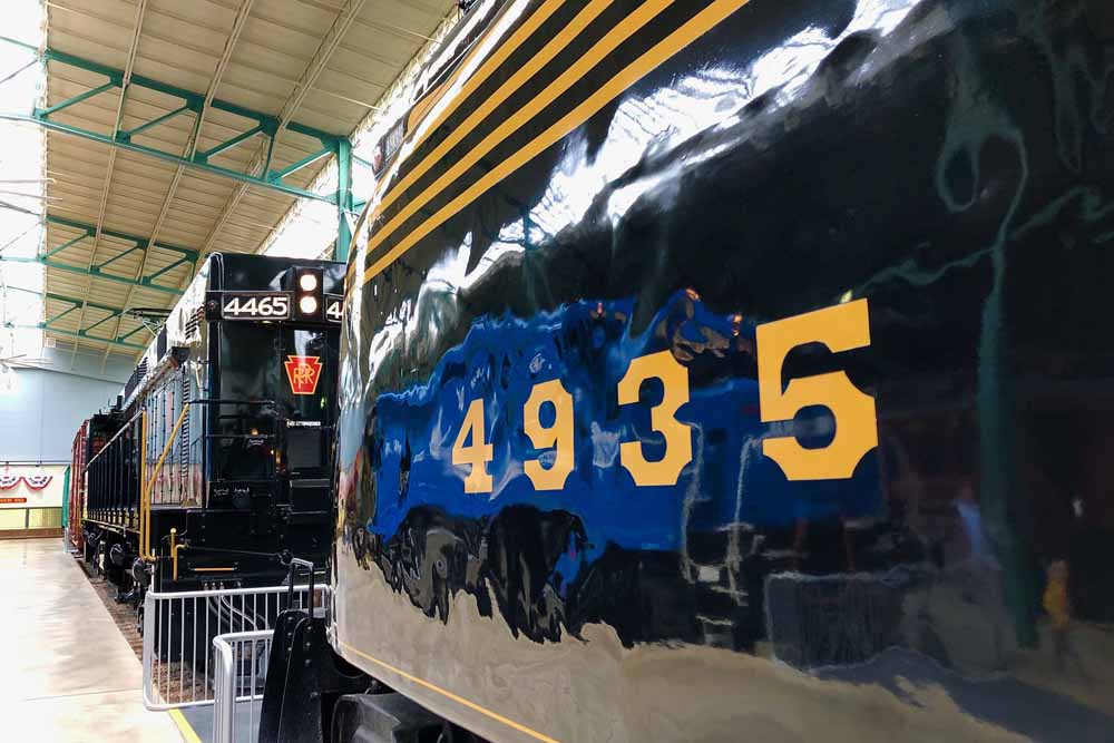 Former Amtrak E44 electric locomotive on indoor display at museum