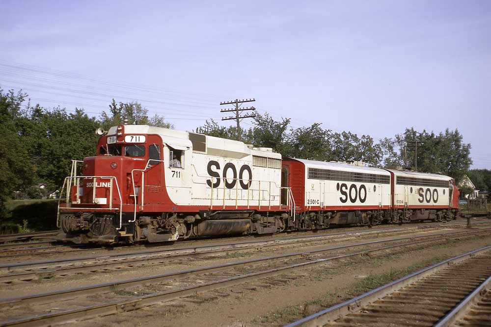 Three red-and-white Soo Line diesel locomotives