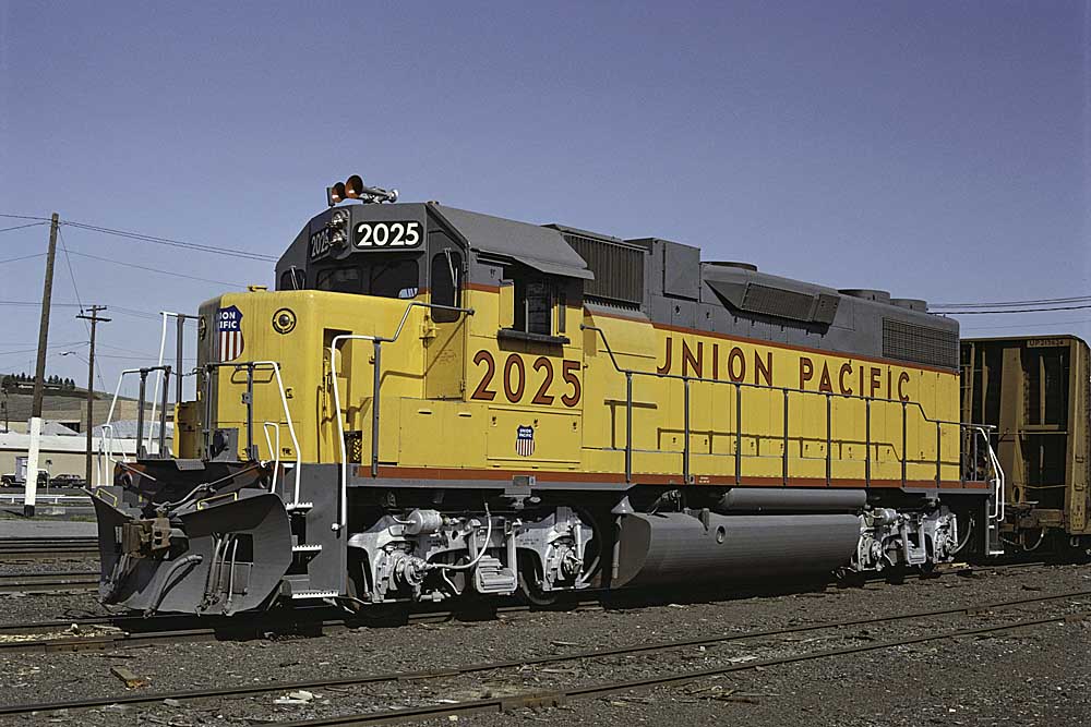 Three-quarter view of eight-wheel EMD diesel locomotive