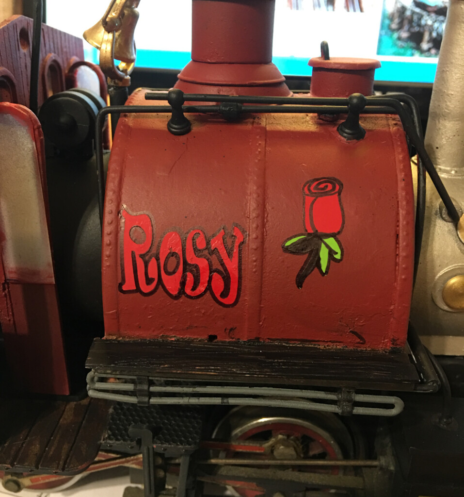 close up of lettering on a model steam locomotive