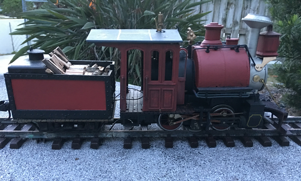 maroon and black model steam engine