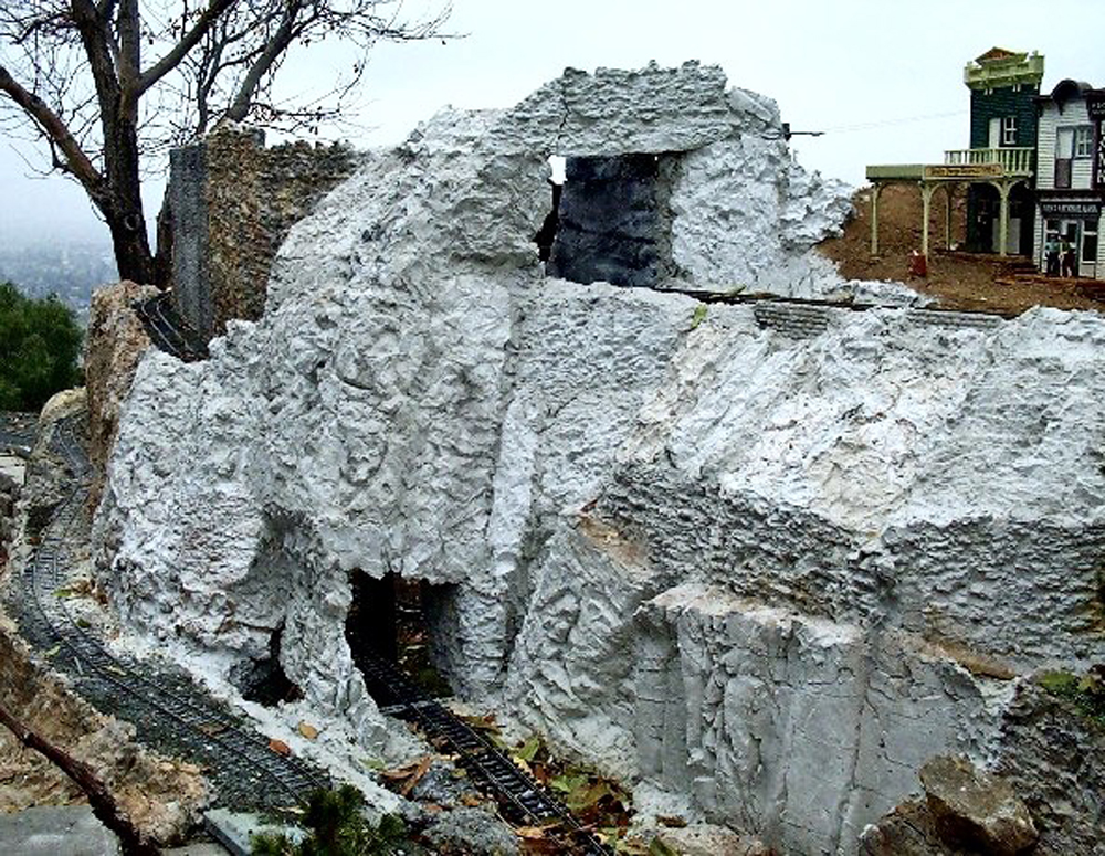 large rock formation on garden railway