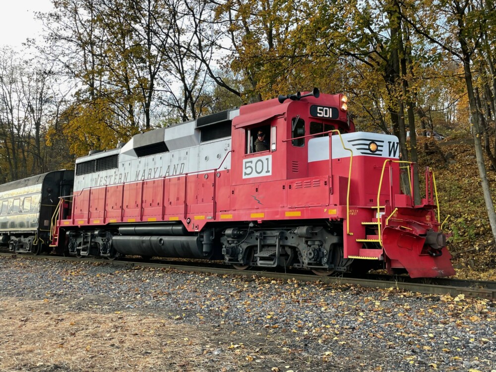 An image of a red and white diesel locomotive lettered Western Maryland