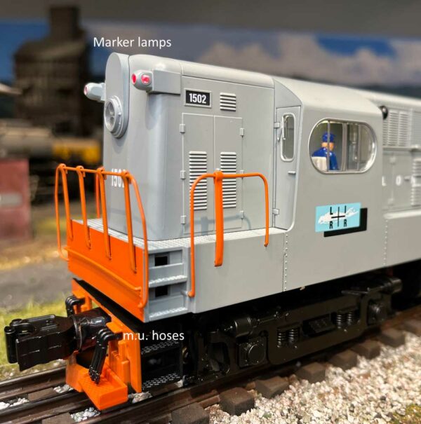 Lionel H15-44 short hood and cab view with crew figure.