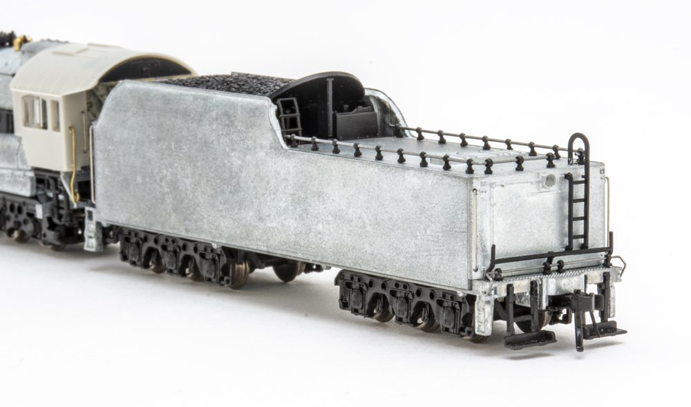 Color photo showing side and rear of N scale tender.