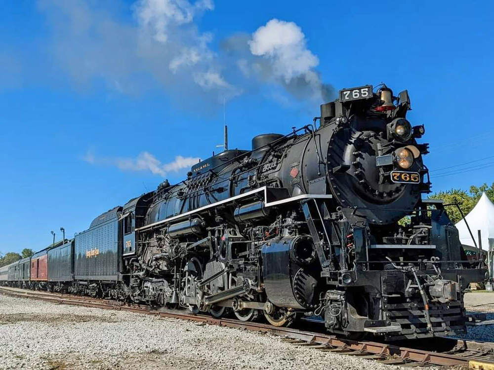 A steam engine sits waiting for passengers to board