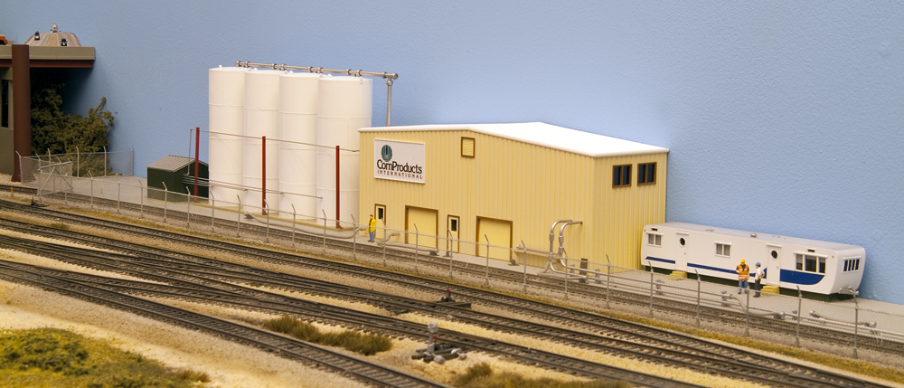Color photo of corn syrup terminal on HO scale layout.
