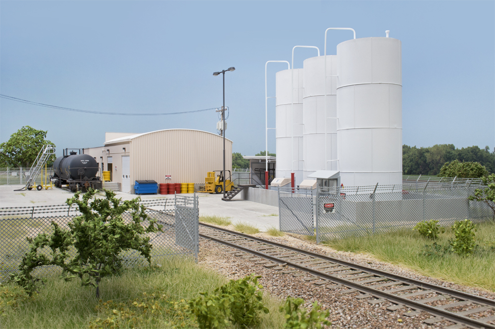 Color photo showing rear of HO scale oil-recycling plant.