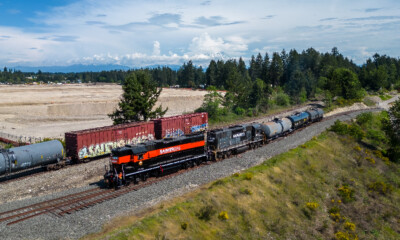 Two high-nose diesel locomotive switching cars.