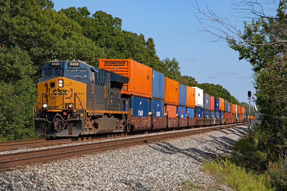 CSX train with orange and blue intermodal containers