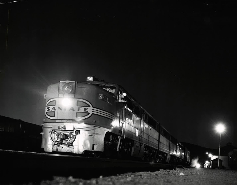 Santa Fe black and white train on track