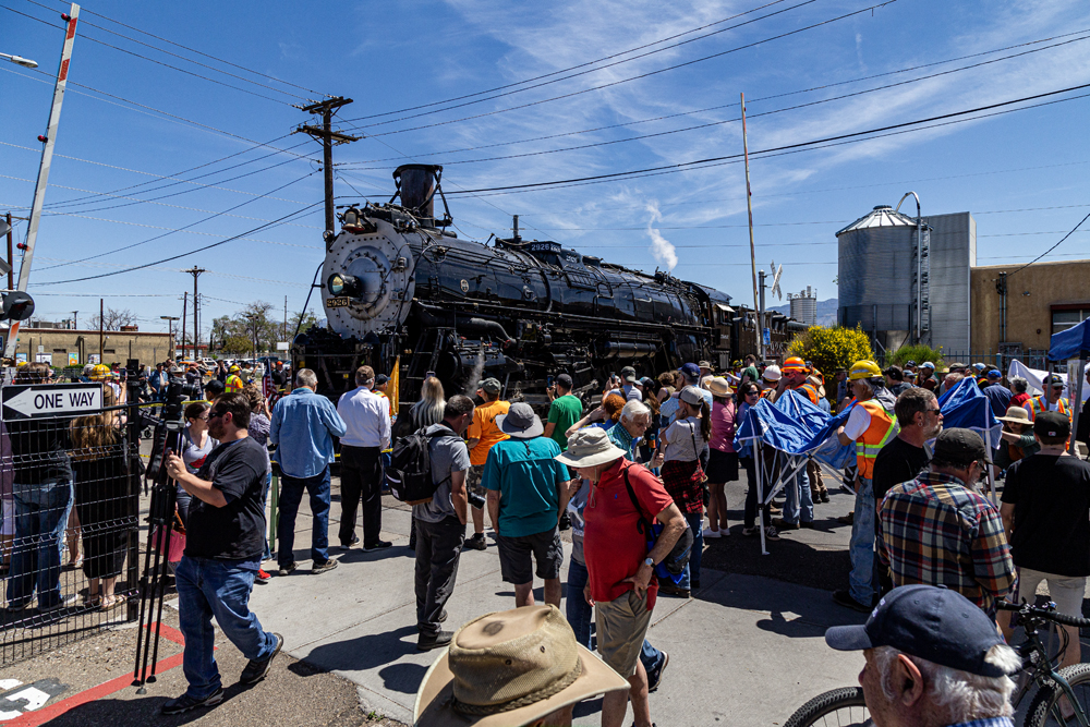 Large crowds around steam locomotive