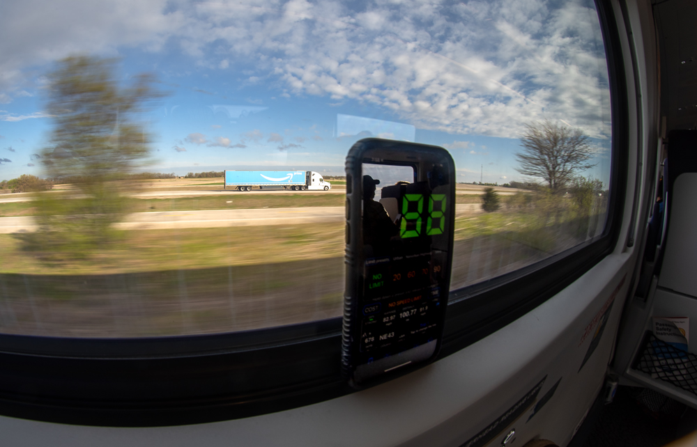 Phone showing 88-mph speed in train window