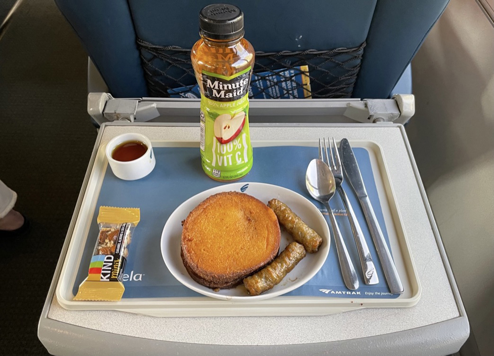 French toast breakfast on tray in passenger car