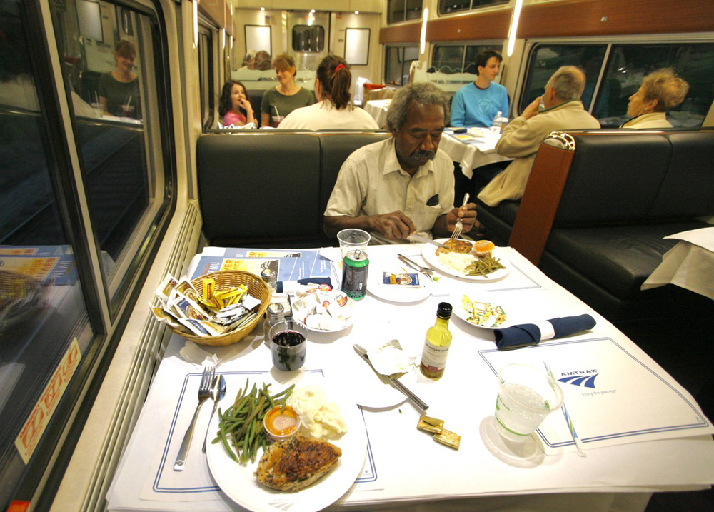 People eating in dining car