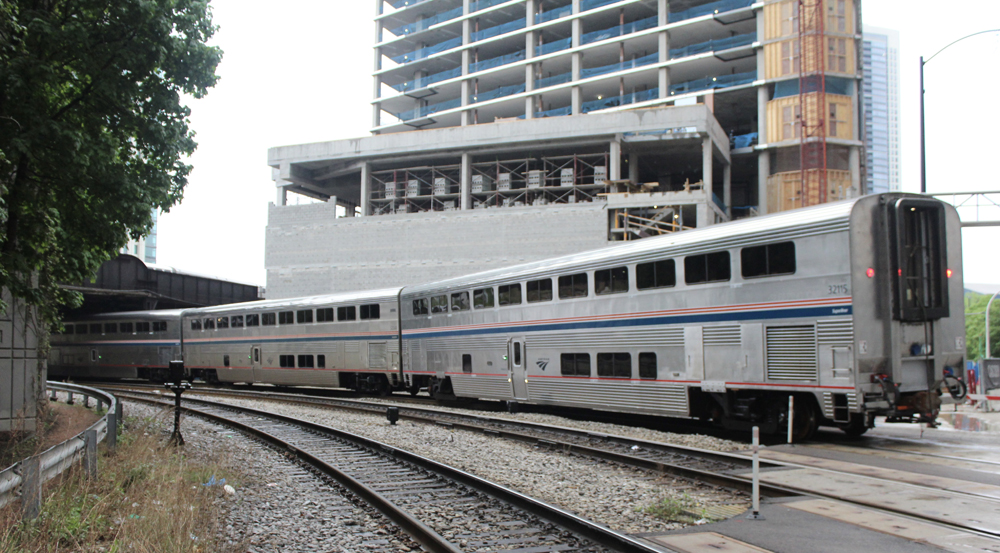 End of passenger train rounds curve