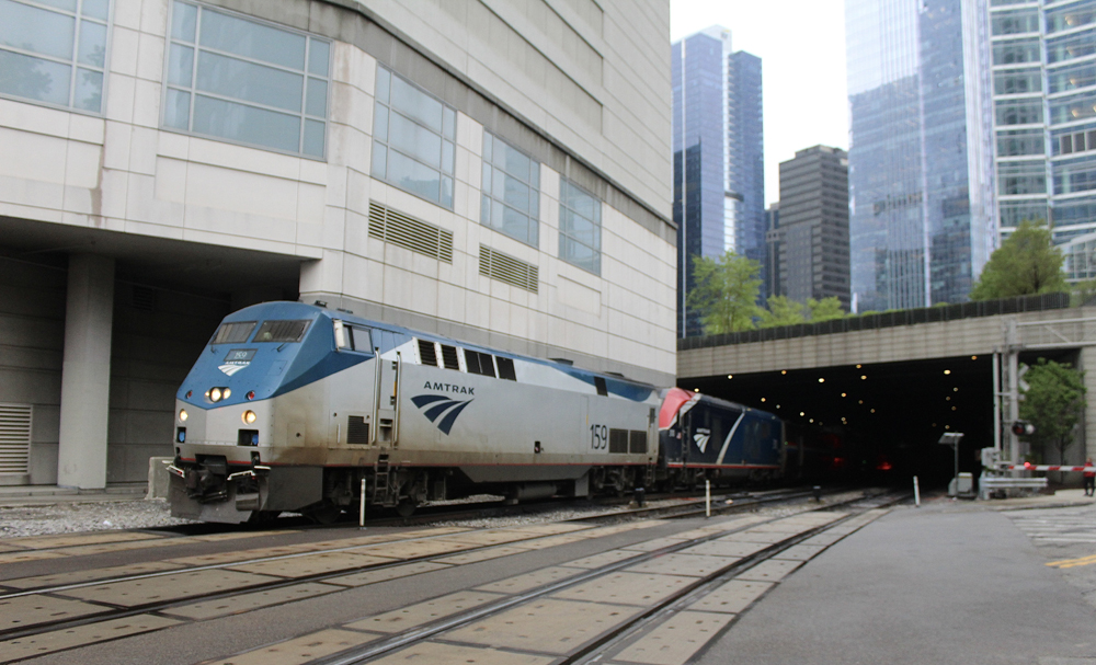 Passenger train emerges from tunnel at Chicago Union Station