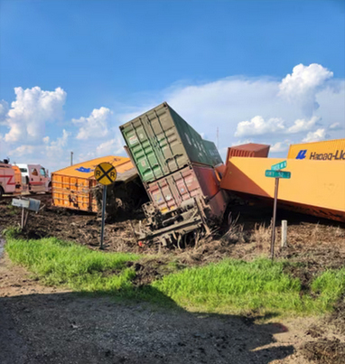 Derailed container flat cars
