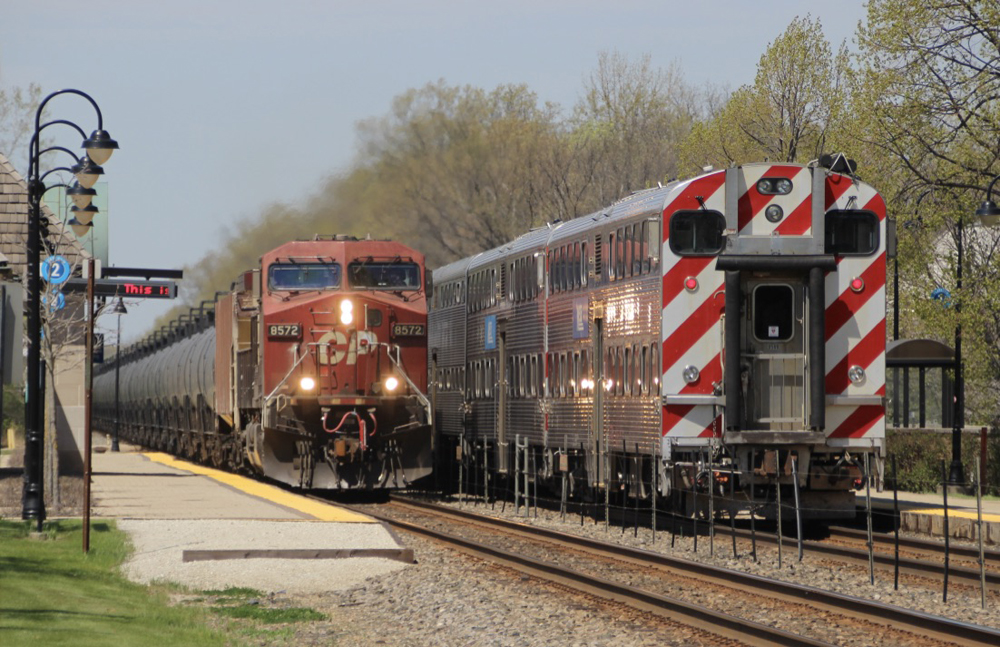 Unit tank-car train and commuter train meet