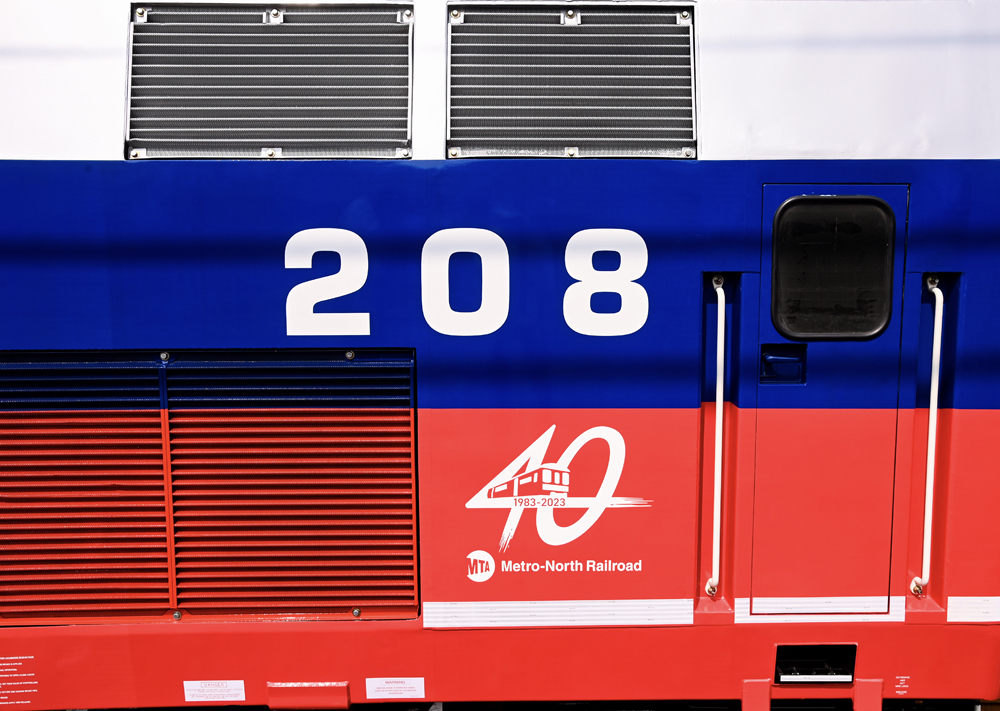 Close-up of 40th-anniversary logo on locomotive