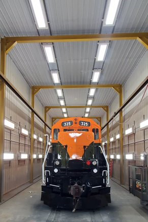 Front view of locomotive in paint booth