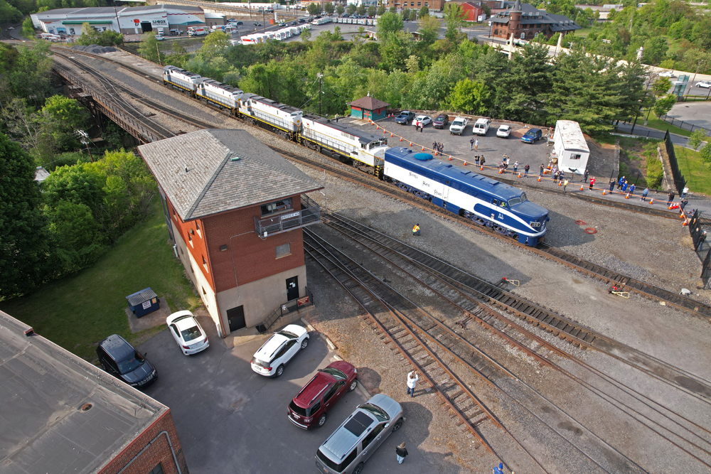 Aerial view of PA and other diesels by tower