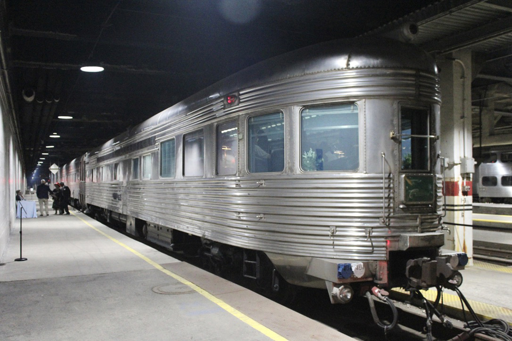 Stainless steel round-end observation car in enclosed area