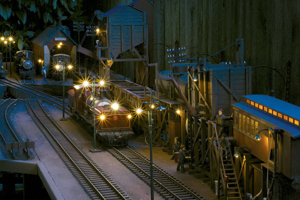 evening scene with steam locomotive on garden railway