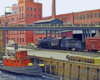 A tugboat bobs alongside a wharf as a steam engine pulls a boxcar through a waterfront industrial scene