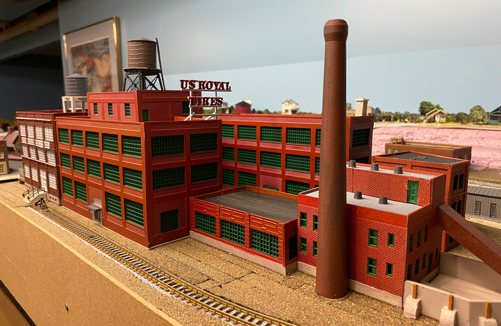 large brown model structure on a layout
