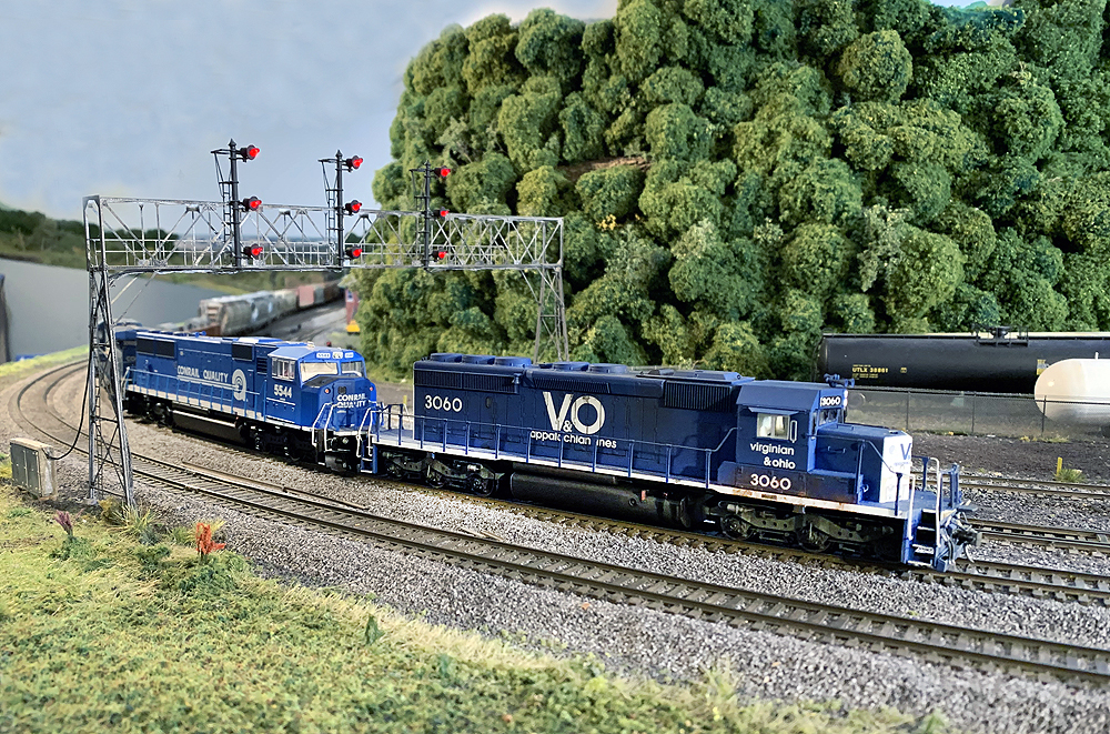 A blue Virginian & Ohio EMD diesel leads a blue Conrail diesel on Dave Abeles’ Onondaga Cutoff.