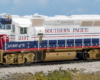 Color photo of HO scale Bicentennial locomotive on scenic base.