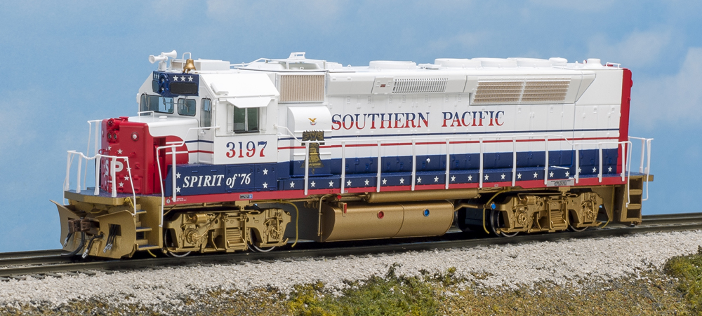 Color photo of HO scale Bicentennial locomotive on scenic base.