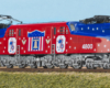 Color image of electric locomotive in patriotic paint scheme.