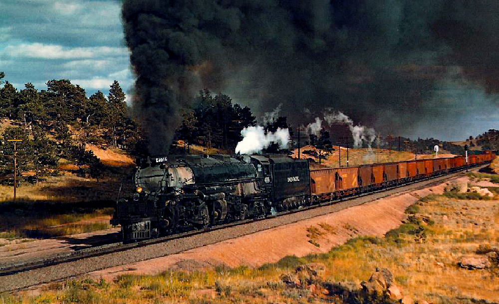 Large black steam locomotive pulling freight train. More of the Big Boy story.