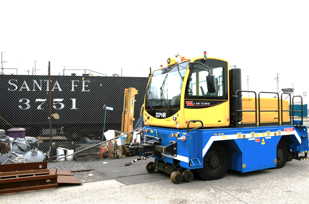 yellow and blue railcar mover